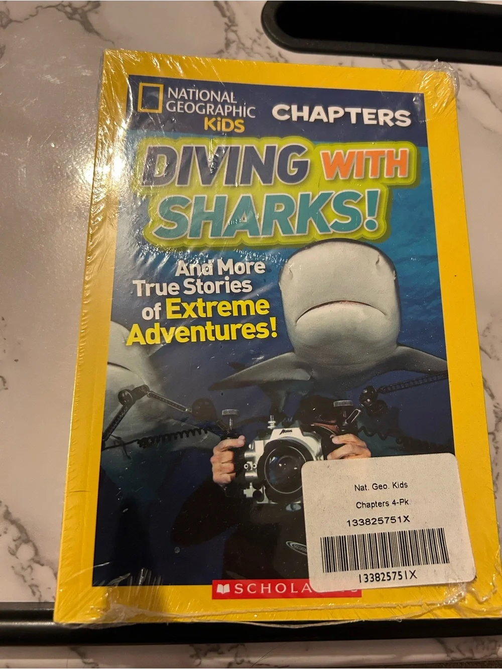 Scholastic National Geographic Kids’ Chapter Books Sharks, Wolves, Owls 4 Pack
